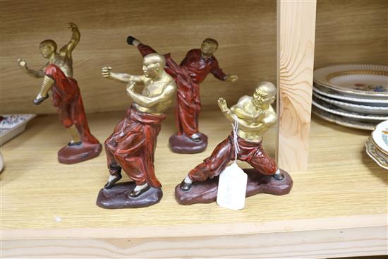 A set of four ceramic figures of boxers